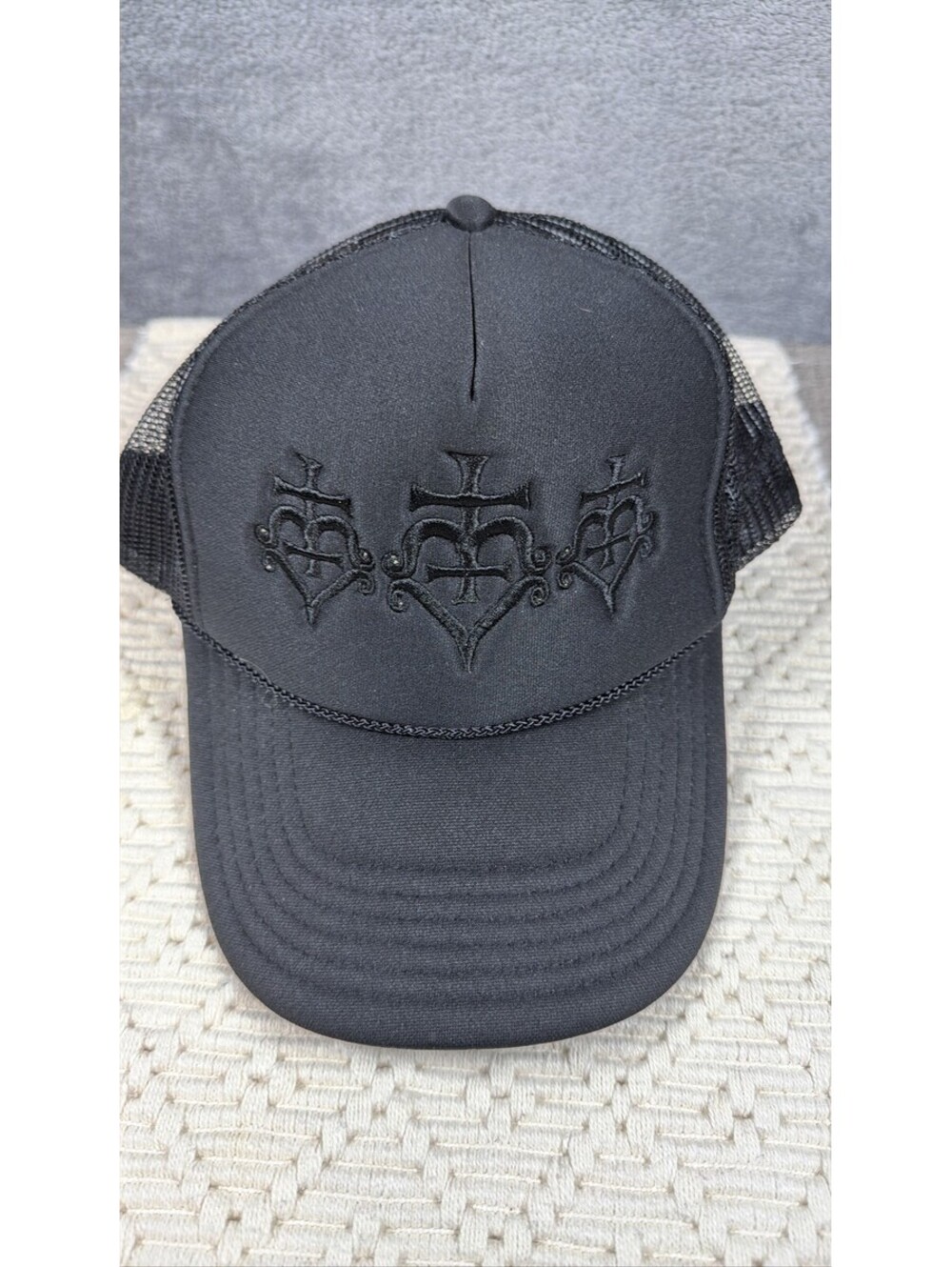 OTTO Black Mesh Trucker Hat with Embroidered Design